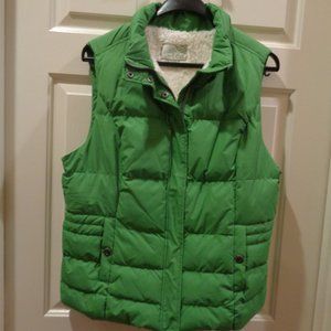 Bright cozy puffy vest with faux fur lining and optional hood